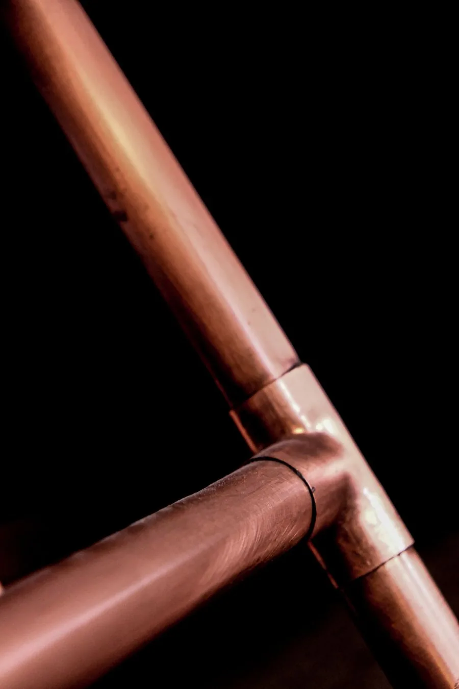 Copper water pipe with a soldered tee fitting
