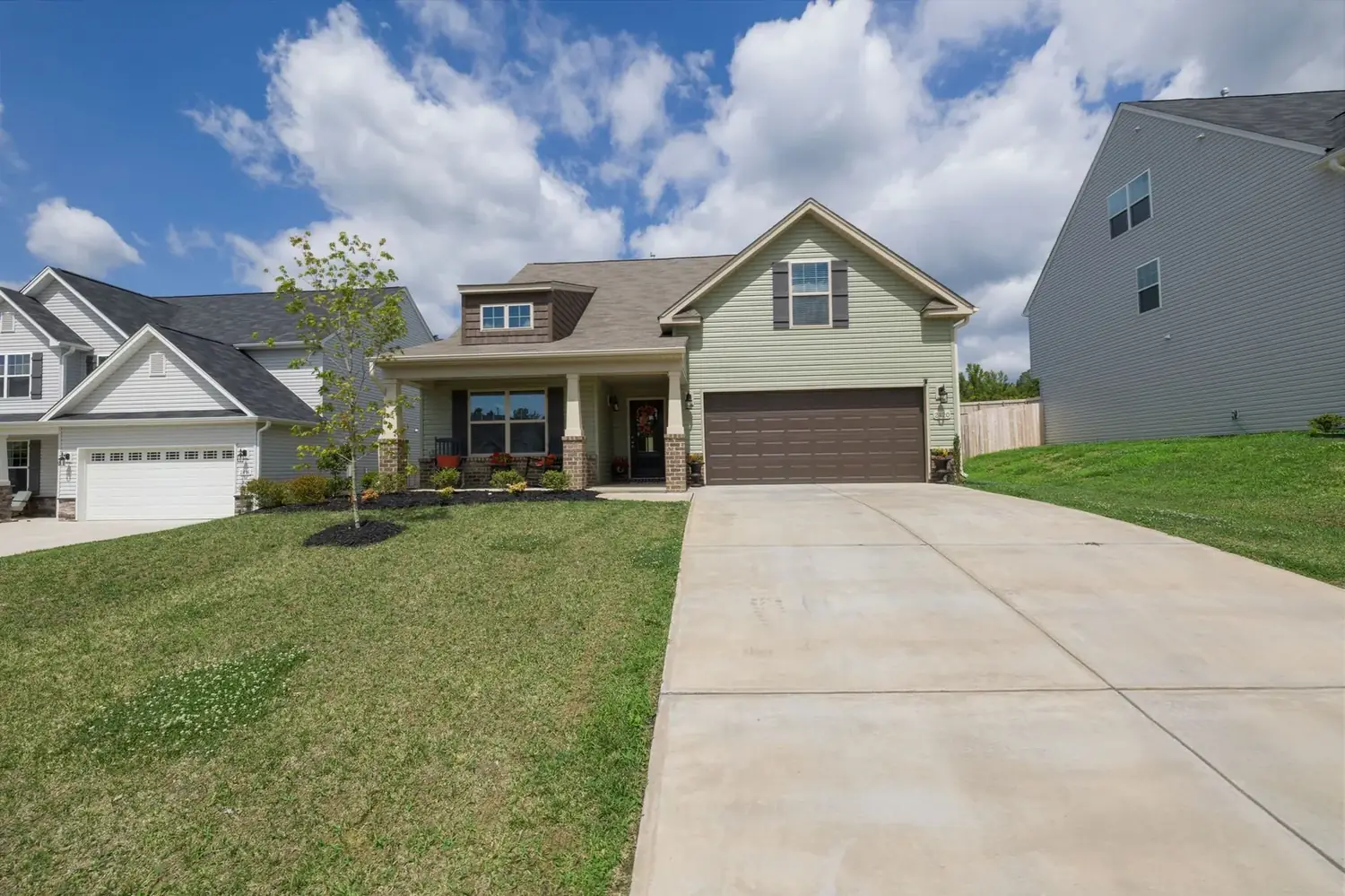 Single family home with a concrete driveway